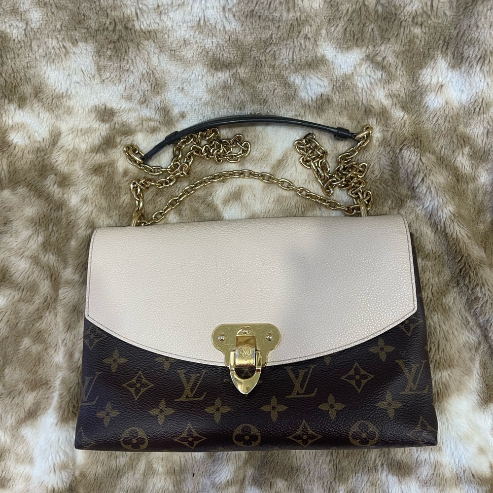 Louis Vuitton cream monogram canvas bag with chain.